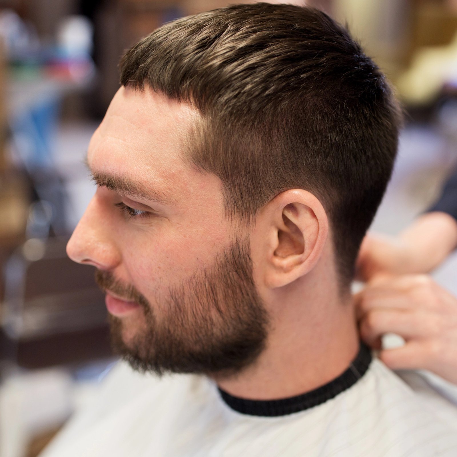 grooming, hairdressing and man in cape with beard at barbershop